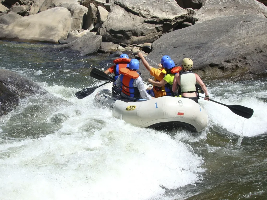 Rafters going down rapids in Frying Pan River in Aspen, Colorado.